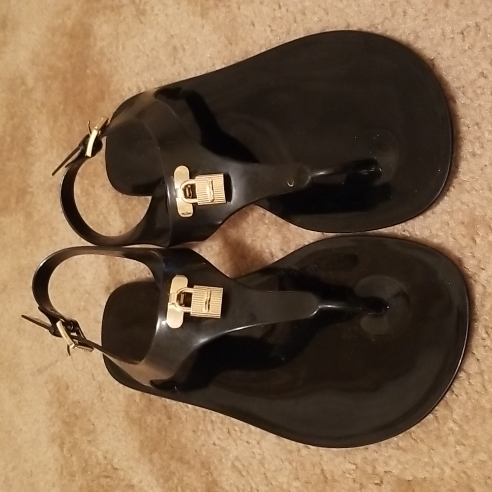 Michael Kors Black Jelly Thong Sandals with Gold Padlock Accent